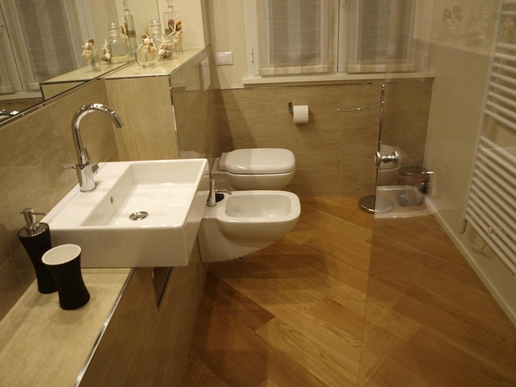 Il Pontile Holidays Apartment Марина ди Пиетрасанта Стая снимка
