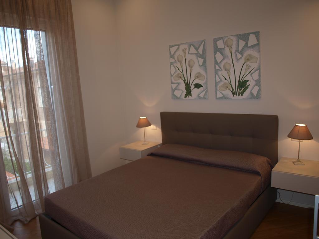 Il Pontile Holidays Apartment Марина ди Пиетрасанта Стая снимка